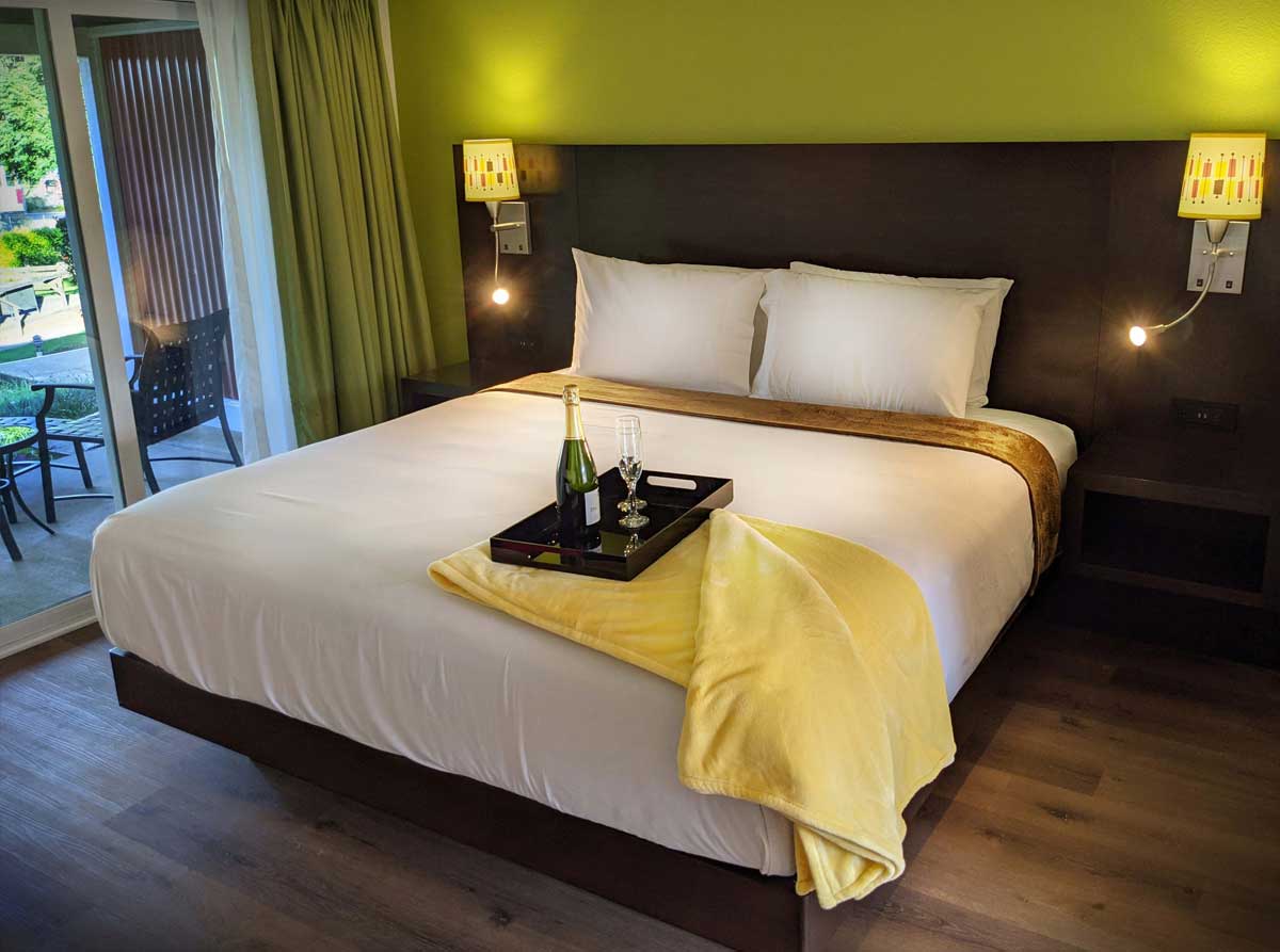 the-foothills-room-and-bed - Foothills Motel The Foothills Motel room and bed with patio